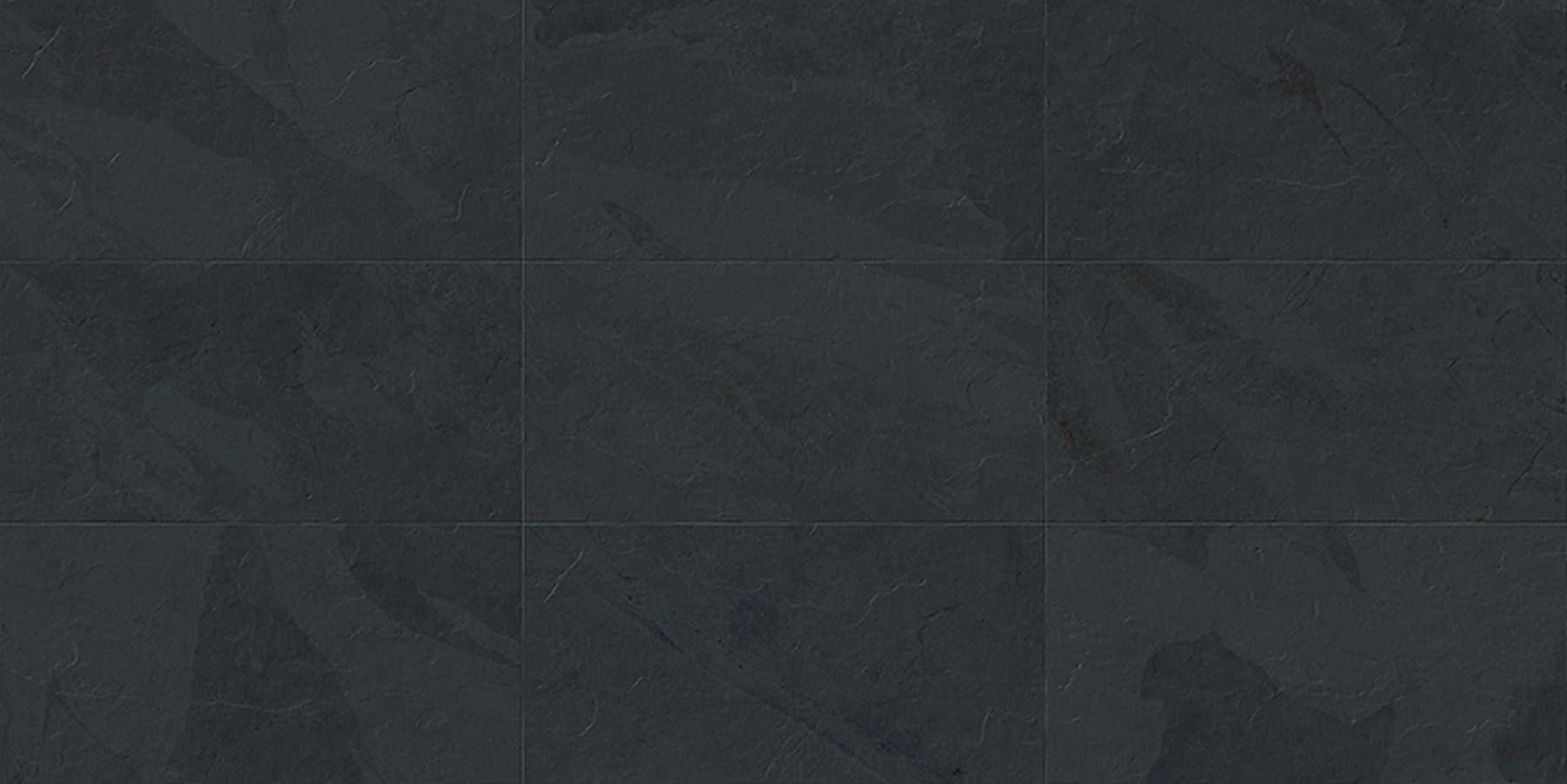 Essence Montauk Black porcelain surface texture and color detail.